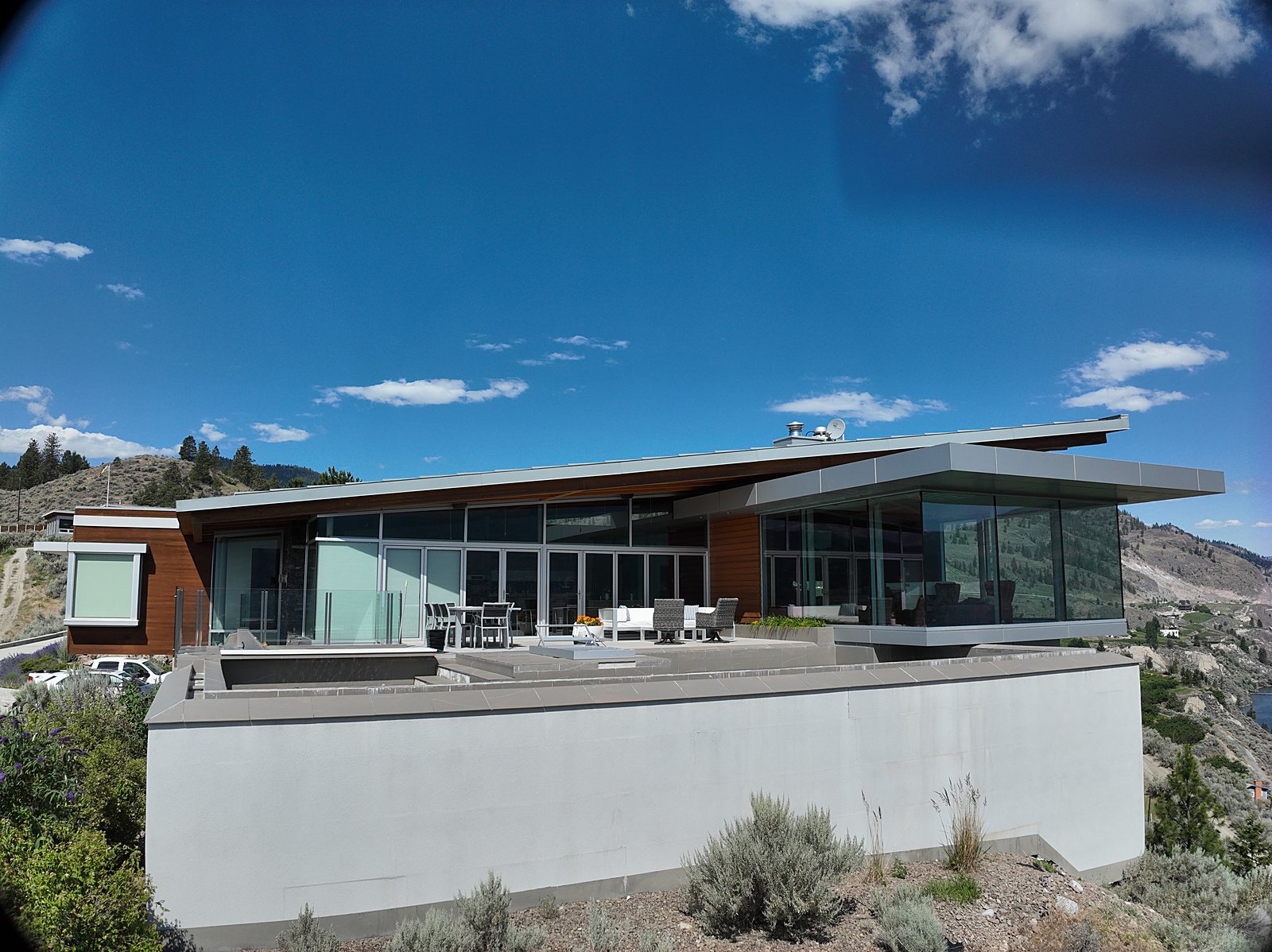 Aerial of a high-end Okanagan estate home and grounds.