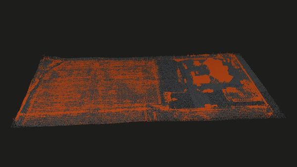 Classified point cloud of a mapped site rendered in 3D, the planning-grade orthomosaic and terrain pipeline used across construction sites.